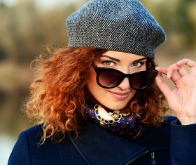 Wearing sunglasses red haired woman Stock Photo 04