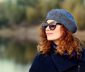 Wearing sunglasses red haired woman Stock Photo 06