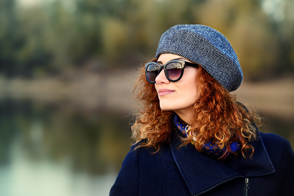 Wearing sunglasses red haired woman Stock Photo 06