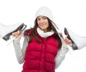 Woman holding skates Stock Photo 01