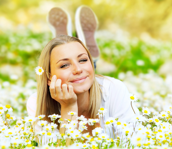 Woman lying in the flowers Stock Photo 01