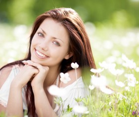 Woman lying in the flowers Stock Photo 04