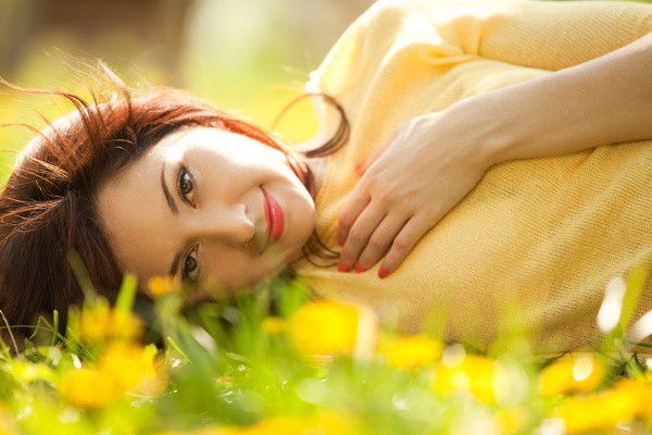 Woman lying in the flowers Stock Photo 07
