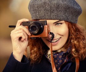 Woman photographing with camera Stock Photo 01