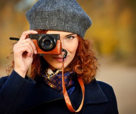 Woman photographing with camera Stock Photo 02