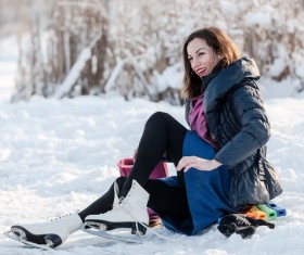 Woman skating outdoors Stock Photo