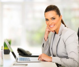 Woman using laptop Stock Photo 01