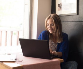 Woman using laptop Stock Photo 04