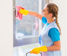 Woman wiping glass Stock Photo 03