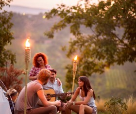Young friends camping gathering Stock Photo 04