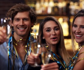 Young friends who drink in bar Stock Photo 01