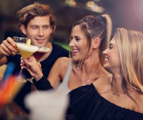 Young friends who drink in bar Stock Photo 04