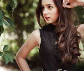 Young lady outdoors wearing black skirt Stock Photo 03