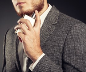 Young man spraying perfume Stock Photo 01