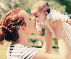 Young mother with baby Stock Photo
