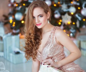 Young woman in elegant dress over christmas interior background Stock Photo 06