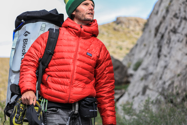 hiker man in red coat Stock Photo
