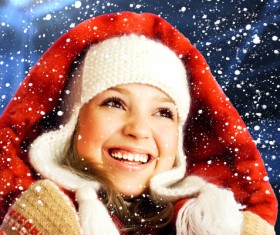 ittle girl looking snowflakes Stock Photo