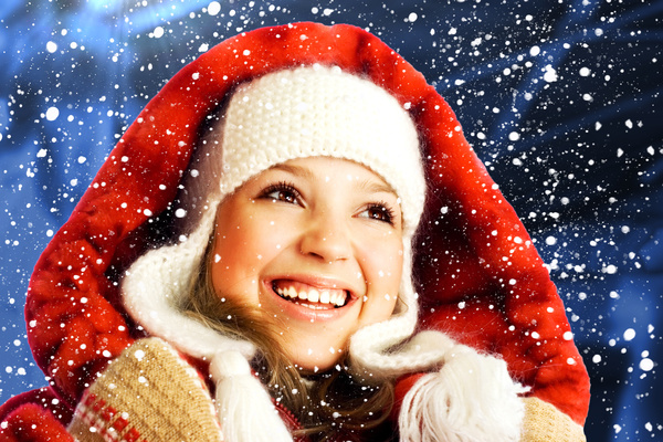 ittle girl looking snowflakes Stock Photo