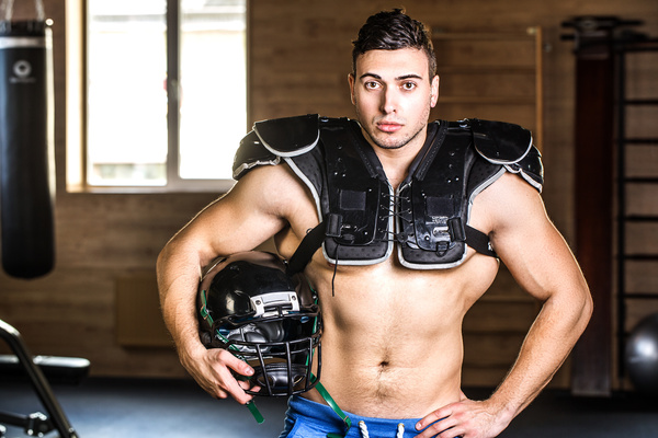 rugby player wearing protective gear Stock Photo