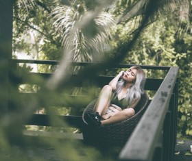 young woman relaxing in natural scene Stock Photo