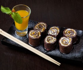 A glass of drink with Fruit rolls Stock Photo