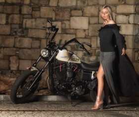 Beautiful fashion model and motorcycle Stock Photo
