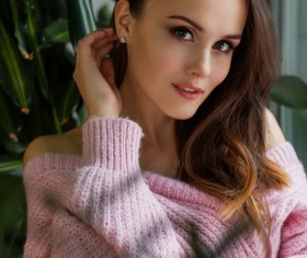 Beautiful woman wearing knitted sweater Stock Photo