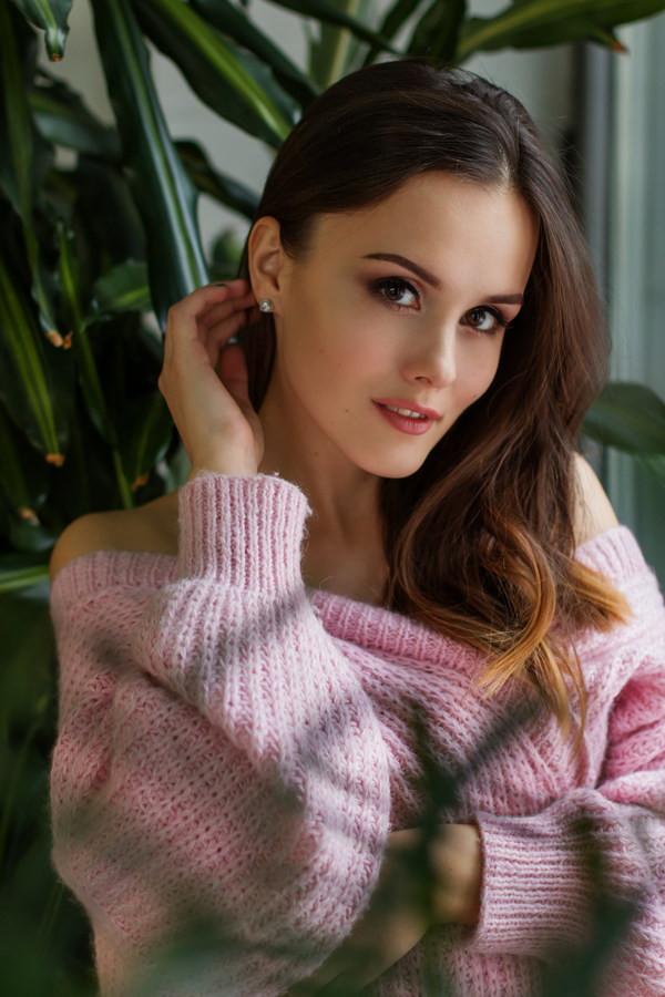 Beautiful woman wearing knitted sweater Stock Photo