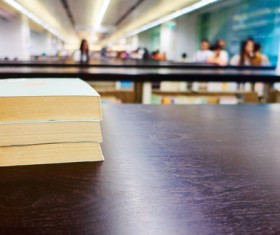 Book on the library desktop Stock Photo