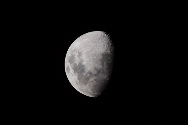 Closeup picture of crescent moon on dark sky Stock Photo