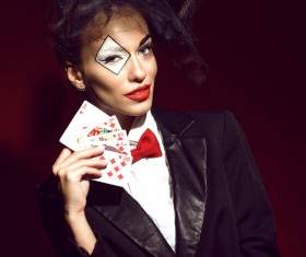 Clown makeup play poker woman Stock Photo 03