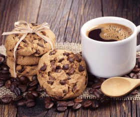 Coffee with chocolate chip cookie and coffee beans Stock Photo