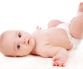 Cute baby in bed Stock Photo
