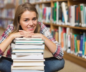 Female college students in the library Stock Photo