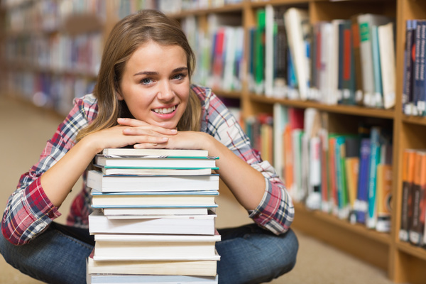 Female college students in the library Stock Photo