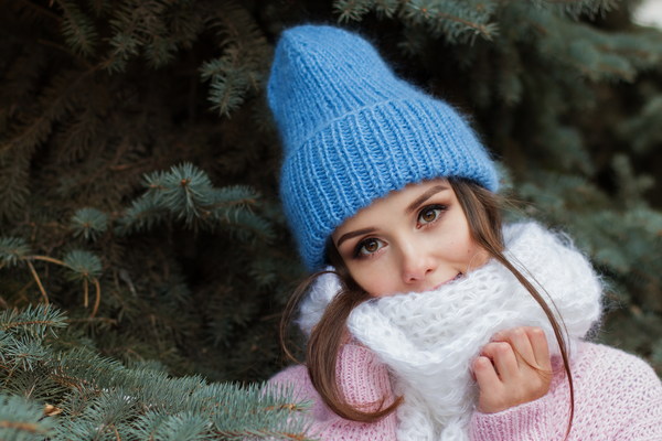 Girl wearing knit hat and knit scarf Stock Photo