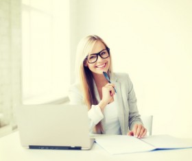 Girl working using laptop Stock Photo