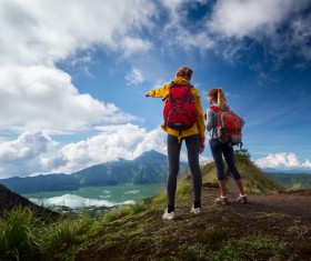 Hiking woman admiring the natural scenery Stock Photo