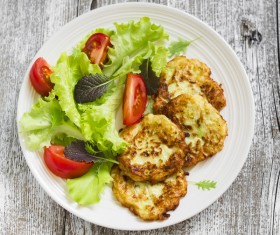 Homemade delicious zucchini fritters Stock Photo 04