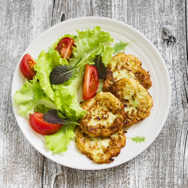 Homemade delicious zucchini fritters Stock Photo 04