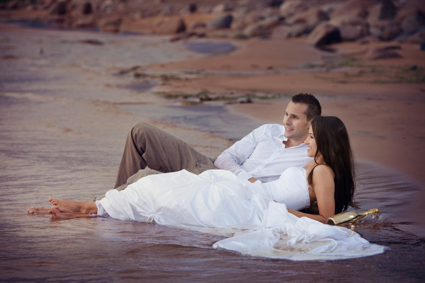 Honeymoon couple on the beach Stock Photo 03