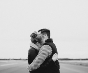 Hugging couple black and white photo Stock Photo
