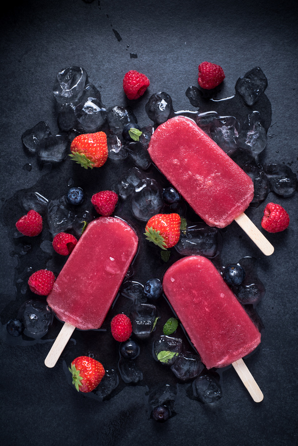 Ice cubes fruit and popsicles Stock Photo