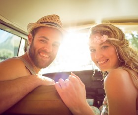 Inside the car smiling couple Stock Photo