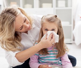 Little girl suffering from cold Stock Photo