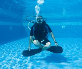Man practicing diving in the swimming pool Stock Photo 02