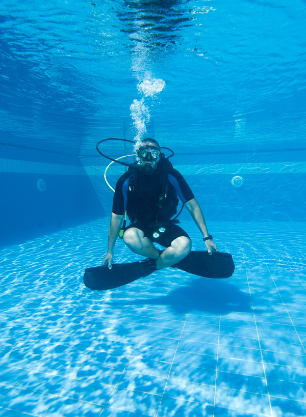 Man practicing diving in the swimming pool Stock Photo 02