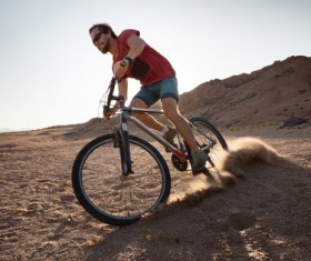 Man riding mountain bike Stock Photo