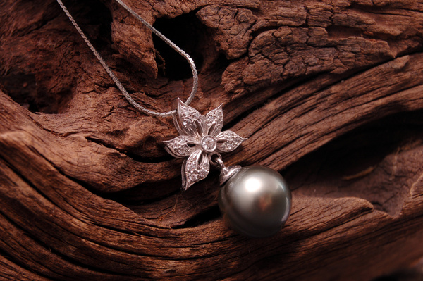 Metal jewelry necklace pendant Stock Photo